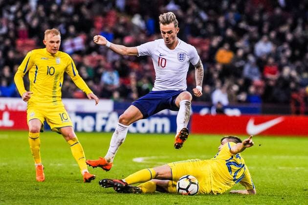 Norwich City s forward James Maddison (10) for England U21 U 21 s jumps over FC Shakhtar Donetsk s midfielder Oleksandr Pikhalyonok (20) for Ukraine U21 s tackle during the International Euro U21 Qualification match between England U21 and Ukraine U21 at Bramall Lane, Sheffield, England on 27 March 2018. Copyright: xStephenxBuckleyx PMI-1923-0060