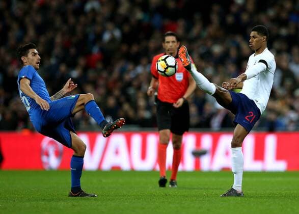 27th March 2018, Wembley Stadium, London, England; International Football Friendly, England versus Italy; Marcus Rashford of England and Lorenzo Pellegrini of Italy compete for the ball high loose ball  ActionPlus12006224