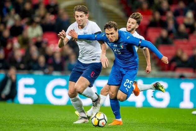 Federico Chiesa of Italy and James Tarkowski of England during the International Friendly Länderspiel match between England and Italy at Wembley Stadium, London, England on 27 March 2018. Copyright: xSalvioxCalabresex 19380058