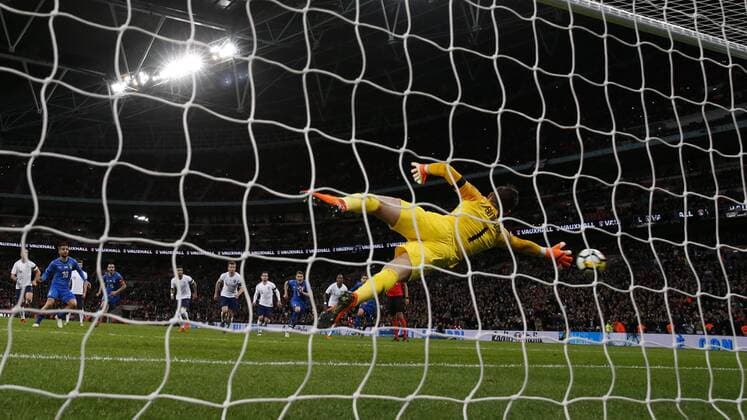 (180328) -- LONDON, March 28, 2018 -- Jack Butland of England fails to save a penalty kick from Lorenzo Insigne of Italy during a friendly soccer match between England and Italy at the Wembley Stadium in London, Britain on March 27, 2018. England and Italy drew 1-1. ) (SP)BRITAIN-LONDON-FRIENDLY SOCCER MATCH-ENGLAND VS ITALY HanxYan 