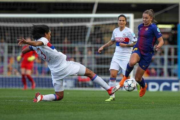28th March 2018, Mini Estad, Barcelona, Spain; Womens Champions League football, quarter final, 2nd leg, Barcelona Women versus Lyon Women; Wendie Renard of Olimpique de Lyon tackles Martens of FC Barcelona Barca  ActionPlus12006331