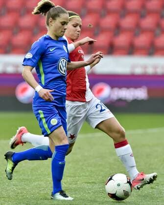 Ewa Pajor of Wolfsburg, left, and Diana Bartovicova of Slavia in action during the UEFA Women s Champions League quarterfinal match SK Slavia Praha vs VfL Wolfsburg, in Prague, Czech Republic, March 28, 2018. (CTKxPhoto VitxSimanek) CTKPhotoP201803280986501  VIS 002