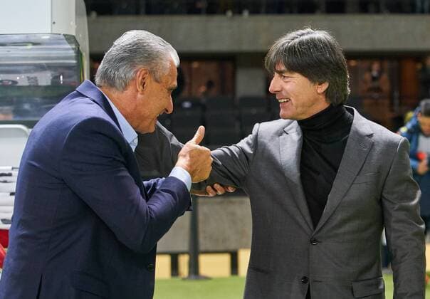 DFB national coach Joachim Jogi LOEW LÖW hugs TITE coach head coach BrazilSCHNEIDER DFB Co trainer assistant coach fairness collegiality hug congratulations congratulate fair GERMANY BRAZIL 0 1 Test match to the World Cup Russia Russia Friendlies German national football team DFB on 27 03 2018 in Berlin