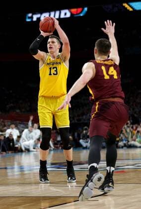 March 31, 2018 - San Antonio, TX, USA - Michigan s Michigan s Moritz Wagner (13) hits a 3-pointer in the second half against Loyol during an NCAA College League USA Tournament national semifinal at the Alamodome in San Antonio, Texas, on Saturday, March 31, 2018. Michigan advanced, 69-57. NCAA Tournament: Loyola vs. Michigan - ZUMAm67_ 20180331_zaf_m67_059 Copyright: xJunfuxHanx