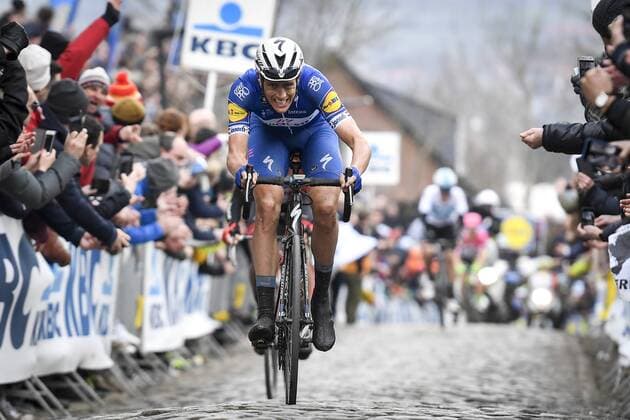 Dutch Niki Terpstra of Quick-Step Floors pictured in action at the Oude Kwaremont hill in Kluisbergen during the 102nd edition of the Ronde van Vlaanderen - Tour des Flandres - Tour of Flanders one day cycling race, 264,7km from Antwerp to Oudenaarde, Sunday 01 April 2018. DIRKxWAEM  x05322364x