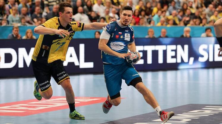 Filip Taleski RNL 28 Alex Dujshebaev Dovichevaeva Kielce 10 Duel duel tackle tackling Dynamics Action Action Handball Champions League Rhein Neckar Löwen PGE Vive Kielce xozx