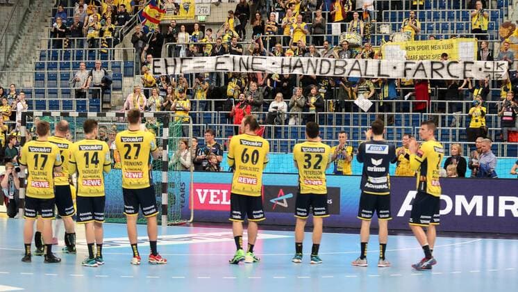 Protest of the fans of the Rhein Neckar Löwen a banner with the inscription EHF A handball farce action against the association EHF fans audience spectators atmosphere atmosphere stadium handball Champions League Rhein Neckar Löwen PGE Vive Kielce xozx