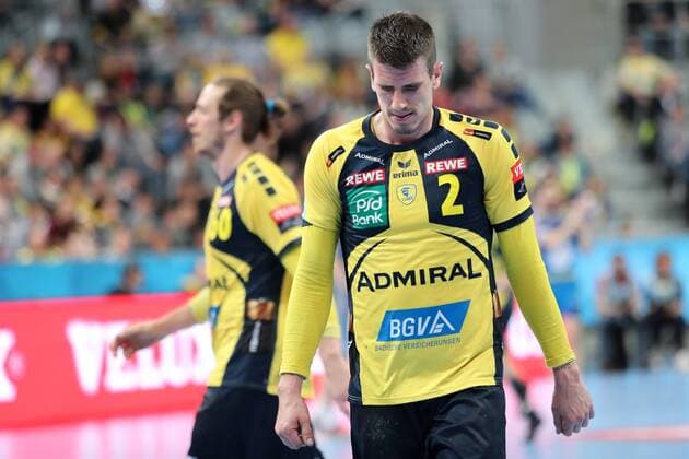 v left Kim Ekdahl du Rietz RNL 60 Andre Schmid Andy Schmid RNL 2 disappointed looking disappointment frustration disappointed pessimistic handball Champions League Rhein Neckar Löwen PGE Vive Kielce xozx