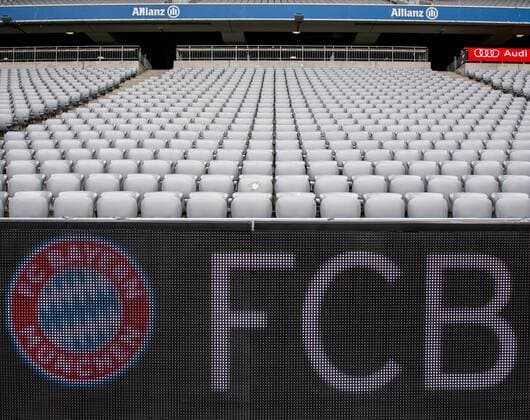 31 March 2018 Munich Allianz Arena Football 1 Bundesliga 28 Matchday FC Bayern Muenchen Borussia Dortmund Overview of the empty Allianz Arena in Munich Home of FC Bayern Munich In the summer of 2018, the old gray seats are removed and replaced by new seats in the club colors red and white then form the lettering Mia san Mia and the club name and the club logo