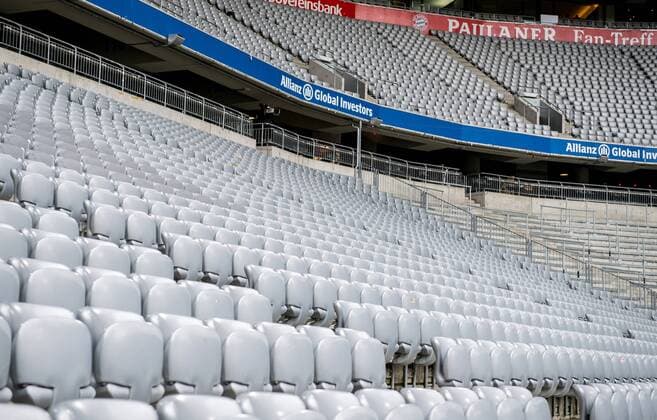 31 March 2018 Munich Allianz Arena Football 1 Bundesliga 28 Matchday FC Bayern Muenchen Borussia Dortmund Overview of the empty Allianz Arena in Munich Home of FC Bayern Munich In the summer of 2018, the old gray seats are removed and replaced by new seats in the club colors red and white then form the lettering Mia san Mia and the club name and the club logo