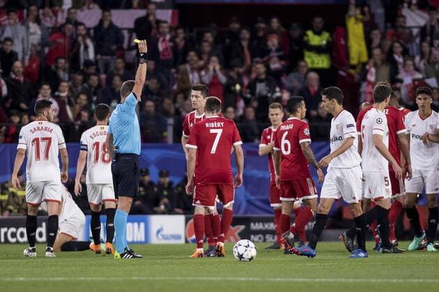 April 3, 2018 - Seville, Spain - FRANCK RIBERY of Bayern (C ) receives a yellow card during the UEFA Champions League Quarter-finals (first leg) match between Sevilla FC and FC Bayern Munchen at Estadio Ramon Sanchez Pizjuan Soccer 2018 - Sevilla FC vs FC Bayern Munchen - ZUMAa142 20180403_zap_a142_007 Copyright: xDanielxGonzalezxAcunax