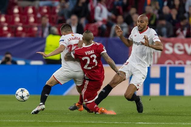 Spain Sevilla 03 04 2018 UEFA Champions League 2017 18 Season Quarter finals First leg Sevilla FC Bayern Munich Pablo Sarabia FC Steven N Zonzi FCS and Arturo Erasmo Vidal FCB in a duel DeFodi048