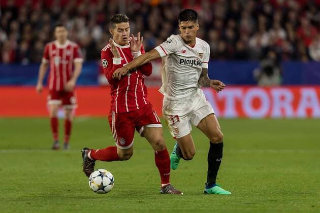 Spain Sevilla 03 04 2018 UEFA Champions League 2017 18 Season Quarter finals First leg Sevilla FC Bayern Munich James Rodriguez FCB and Joaquin Correa FCS in a duel DeFodi048