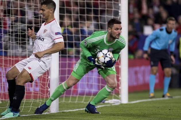 April 3, 2018 - Seville, Spain - SVEN ULREICH of Bayern (R ) makes a save in front of WISSAN BEN YEDDER of Sevilla (L ) during the UEFA Champions League Quarter-finals (first leg) match between Sevilla FC and FC Bayern Munchen at Estadio Ramon Sanchez Pizjuan Soccer 2018 - Sevilla FC vs FC Bayern Munchen - ZUMAa142 20180403_zap_a142_023 Copyright: xDanielxGonzalezxAcunax