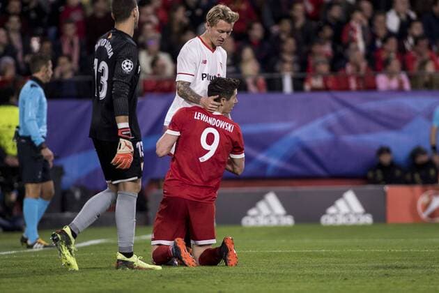 April 3, 2018 - Seville, Spain - ROBERT LEWANDOWSKI of Bayern (C ) laments after missing a chance at goal during the UEFA Champions League Quarter-finals (first leg) match between Sevilla FC and FC Bayern Munchen at Estadio Ramon Sanchez Pizjuan Soccer 2018 - Sevilla FC vs FC Bayern Munchen - ZUMAa142 20180403_zap_a142_027 Copyright: xDanielxGonzalezxAcunax