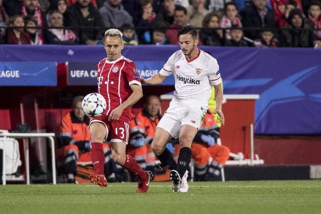 April 3, 2018 - Seville, Spain - RAFINHA of Bayern (L ) vies for the ball with PABLO SARABIA of Sevilla R ) during the UEFA Champions League Quarter-finals (first leg) match between Sevilla FC and FC Bayern Munchen at Estadio Ramon Sanchez Pizjuan Soccer 2018 - Sevilla FC vs FC Bayern Munchen - ZUMAa142 20180403_zap_a142_032 Copyright: xDanielxGonzalezxAcunax