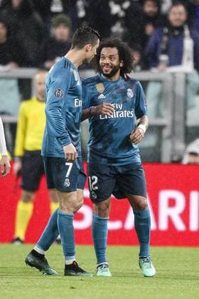 April 3, 2018 - Turin, Italy - Real Madrid forward Cristiano Ronaldo (7) talks with Real Madrid defender Marcelo (12) during the Uefa Champions League Round of 16 football match JUVENTUS - REAL MADRID on 03 04 2018 at the Allianz Stadium in Turin, Italy. Juventus v Real Madrid - UEFA Champions League Quarter Final Leg One  - ZUMAn230 20180403_zaa_n230_433 Copyright: xMatteoxBottanellix