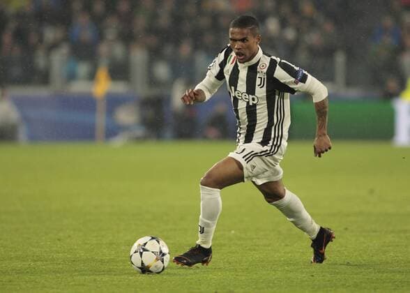 April 3, 2018 - Turin, Italy - Douglas Costa during the UEFA Champions League quarter-final first leg football match between Juventus and Real Madrid at the Allianz Stadium in Turin on April 3, 2018. Juventus v Real Madrid - UEFA Champions League Quarter Final Leg One  - ZUMAn230 20180403_zaa_n230_482 Copyright: xLorisxRosellix