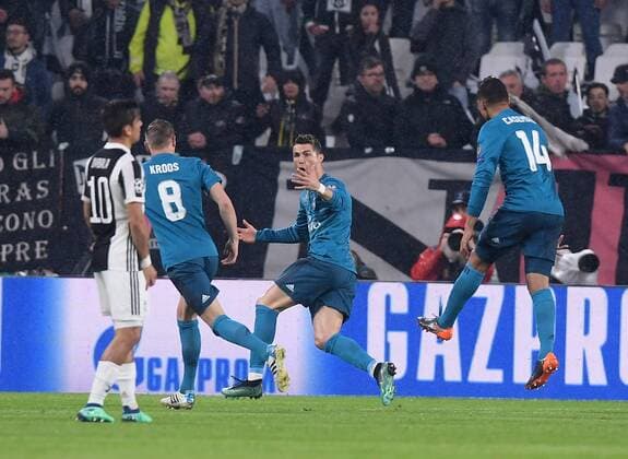 (180404) -- TURIN, April 4, 2018 -- Real Madrid s Cristiano Ronaldo (2nd R) celebrates scoring during the UEFA Champions League quarterfinal first leg soccer match between Juventus and Real Madrid in Turin, Italy, on April 3, 2018. Real Madrid won 3-0. ) (wll) (SP)ITALY-TURIN-SOCCER-UEFA-CHAMPIONS LEAGUE-JUVENTUS VS REAL MADRID AlbertoxLingria 