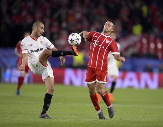 03 04 2018 Football UEFA Champions League 2017 2018 Quarter-finals FC Sevilla FC Bayern Munich at the Ramon Sanchez Pizjuan Sevilla Spain v li Guido Pizarro Sevilla FC against Thiago FC Bayern Munich