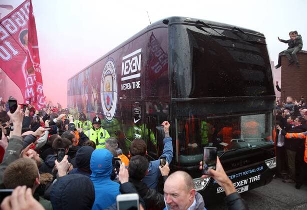 4th April 2018, Anfield, Liverpool, England; UEFA Champions League football, quarter final 1st leg, Liverpool versus Manchester City; Liverpool fans greet the arrival of the Manchester City coache before the match with flares and flags  ActionPlus12008333