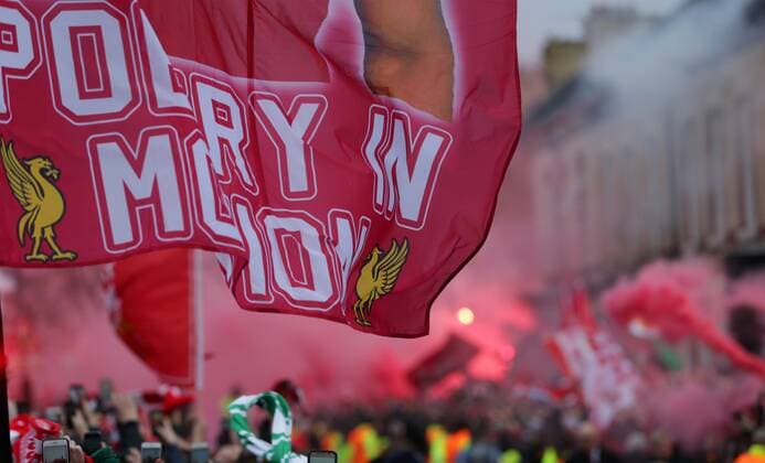4th April 2018, Anfield, Liverpool, England; UEFA Champions League football, quarter final 1st leg, Liverpool versus Manchester City; Liverpool fans greet the arrival of the team coaches before the match with flares and flags  ActionPlus12008340
