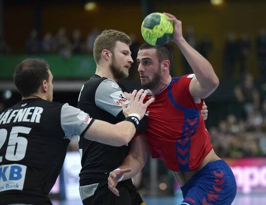 Julius Khn Kuehn GER 35 and Philipp Weber GER 20 against Stevan Sretenovic SRB 41 at the game Germany GER vs Serbia SRB Handball Laenderspiel EHF Testspiel 04 04 2018 Leipzig Copyright: xEIBNER ChristianxModlax EP_CMA