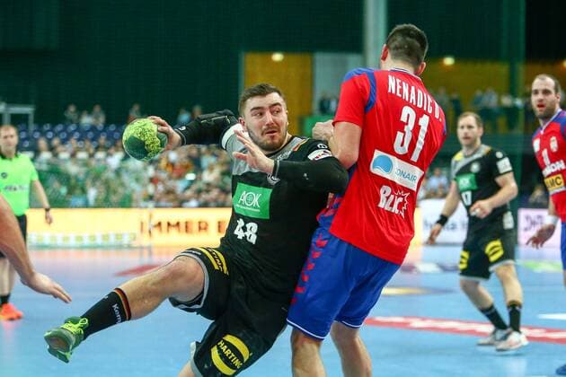 Germany Serbia Handball Leipzig 04 04 2018 Arena Leipzig Handball Internationals Men Germany Serbia 26 19 12 7 Pictured v l Jannik Kohlbacher 48 Germany and Drasko Nenadic 31 Serbia