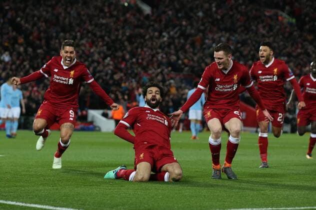 Mohamed Salah of Liverpool (c) celebrates scoring the first goal during the Champions League Quarter Final 1st Leg, match at Anfield Stadium, Liverpool. Picture date: 4th April 2018. Picture credit should read: Simon Bellis Sportimage EDITORIAL USE ONLY. No use with unauthorised audio, video, data, fixture lists, club league logos or live services. Online in-match use limited to 120 images, no video emulation. No use in betting, games or single club league player publications.