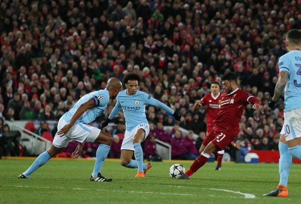 Alex Oxlade-Chamberlain of Liverpool scores the second goal during the Champions League Quarter Final 1st Leg, match at Anfield Stadium, Liverpool. Picture date: 4th April 2018. Picture credit should read: Simon Bellis Sportimage EDITORIAL USE ONLY. No use with unauthorised audio, video, data, fixture lists, club league logos or live services. Online in-match use limited to 120 images, no video emulation. No use in betting, games or single club league player publications.