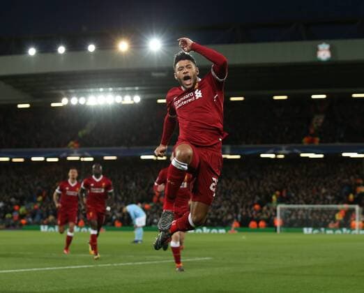Alex Oxlade-Chamberlain of Liverpool jumps up to Celebrate scoring the second goal during the Champions League Quarter Final 1st Leg, match at Anfield Stadium, Liverpool. Picture date: 4th April 2018. Picture credit should read: Simon Bellis Sportimage EDITORIAL USE ONLY. No use with unauthorised audio, video, data, fixture lists, club league logos or live services. Online in-match use limited to 120 images, no video emulation. No use in betting, games or single club league player publications.
