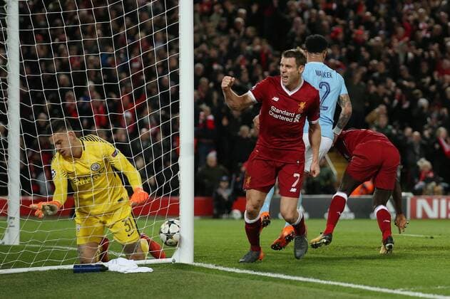 Ederson of Manchester City dejected after Sadio Mane of Liverpool (r) scores the third goal during the Champions League Quarter Final 1st Leg, match at Anfield Stadium, Liverpool. Picture date: 4th April 2018. Picture credit should read: Simon Bellis Sportimage EDITORIAL USE ONLY. No use with unauthorised audio, video, data, fixture lists, club league logos or live services. Online in-match use limited to 120 images, no video emulation. No use in betting, games or single club league player publications.