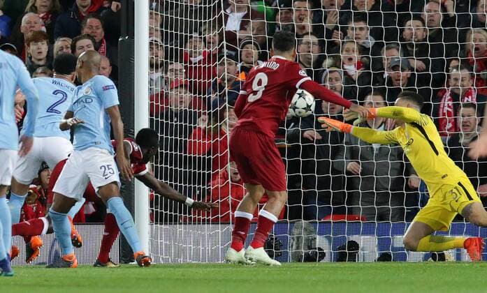 4th April 2018, Anfield, Liverpool, England; UEFA Champions League football, quarter final 1st leg, Liverpool versus Manchester City; Sadio Mane of Liverpool beats Ederson of Manchester City to score Liverpool s third goal in the 31st minute  ActionPlus12008368