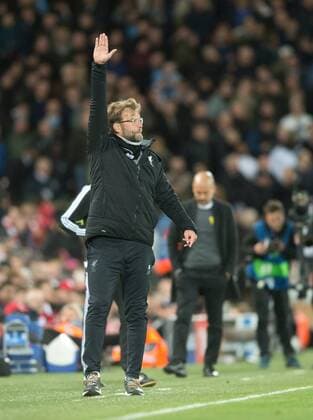 Liverpool v Manchester City UEFA Champions League Quarter Final Liverpool manager Jurgen Klopp instructs his players as Manchester City manager Pep Guardiola has a look of dejection in the background during the UEFA Champions League Quarter Final match at Anfield, Liverpool Content Not Available For UK Newspapers Copyright: xRussellxHartx FIL-11605-0013