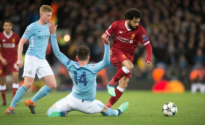 Liverpool v Manchester City UEFA Champions League Quarter Final Mohamed Salah of Liverpool (right) gets past Aymeric Laporte of Manchester City during the UEFA Champions League Quarter Final match at Anfield, Liverpool Content Not Available For UK Newspapers Copyright: xRussellxHartx FIL-11605-0015