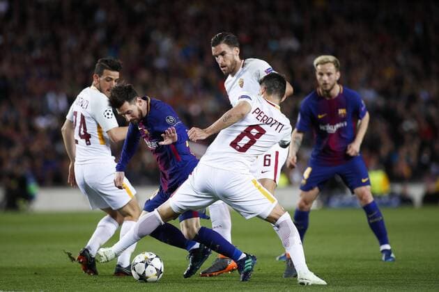 4th April 2018, Camp Nou, Barcelona, Spain; UEFA Champions League football, quarter final 1st leg, Barcelona versus AS Roma; Leo Messi of FC Barcelona Barca surrounded by Diego Perotti and Alessandro Florenzi of AS Roma  ActionPlus12008390