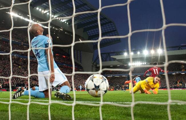 Liverpool v Manchester City UEFA Champions League Quarter Final Vincent Kompany of Manchester City (left) and Manchester City goalkeeper Ederson (right) have a look of dejection after Mohamed Salah of Liverpool scores his team s 1st goal to make it 1-0 during the UEFA Champions League Quarter Final match at Anfield, Liverpool Content Not Available For UK Newspapers Copyright: xRussellxHartx FIL-11605-0030