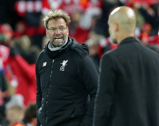4th April 2018, Anfield, Liverpool, England; UEFA Champions League football, quarter final 1st leg, Liverpool versus Manchester City; Jurgen Klopp, Liverpool manager reacts in the direction of Pep Guardiola, manager of Manchester City as City have a goal disallowed  ActionPlus12008448