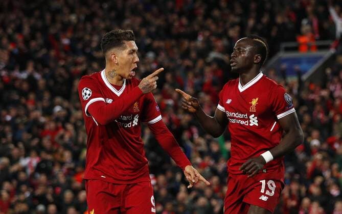 Football - 2017 2018 UEFA Champions League - Quarter-Final, First Leg: Liverpool vs. Manchester City Sadio Mane of Liverpool celebrates scoring the third goal at Anfield. COLORSPORT LYNNE CAMERON 
