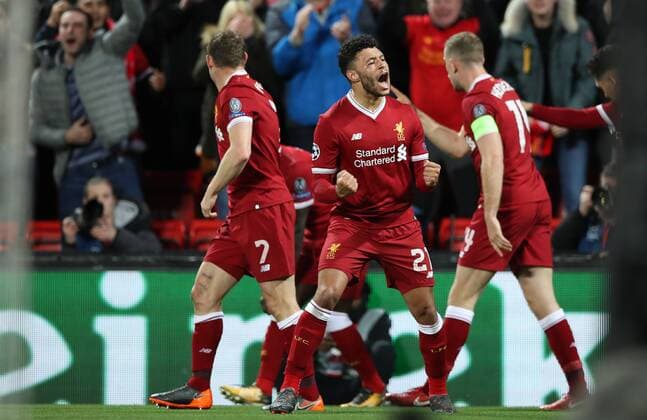 Football - 2017 2018 UEFA Champions League - Quarter-Final, First Leg: Liverpool vs. Manchester City Alex Oxlade-Chamberlain of Liverpool celebrates scoring the second goal at Anfield. COLORSPORT LYNNE CAMERON 