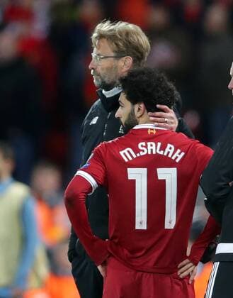 4th April 2018, Anfield, Liverpool, England; UEFA Champions League football, quarter final 1st leg, Liverpool versus Manchester City; Jurgen Klopp, Liverpool manager puts his arm around Mohammed Salah of Liverpool as he leaves the pitch after being substituted  ActionPlus12008545