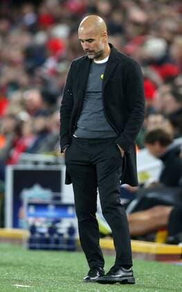 4th April 2018, Anfield, Liverpool, England; UEFA Champions League football, quarter final 1st leg, Liverpool versus Manchester City; Pep Guardiola, manager of Manchester City looks dejected at the end of the first half  ActionPlus12008547