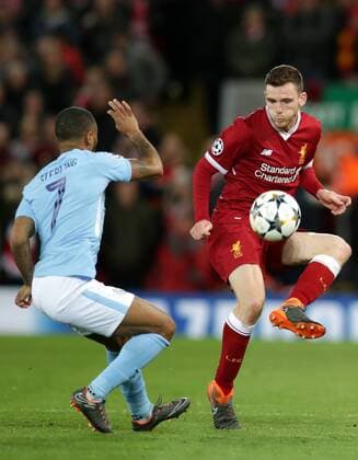 4th April 2018, Anfield, Liverpool, England; UEFA Champions League football, quarter final 1st leg, Liverpool versus Manchester City; Andrew Robertson of Liverpool takes on Raheem Sterling of Manchester City  ActionPlus12008548