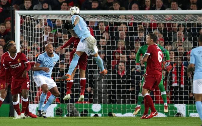 4th April 2018, Anfield, Liverpool, England; UEFA Champions League football, quarter final 1st leg, Liverpool versus Manchester City; Nicolas Otamendi of Manchester City heads at goal but his effort was saved by Loris Karius, Liverpool goalkeeper  ActionPlus12008556