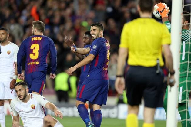 April 4, 2018 - Barcelona, Spain - LUIS SUAREZ of FC Barcelona Barca smiles and celebrates while KOSTAS MANOLAS of AS Roma (sit down) looks dejected after scoring an own goal during the UEFA Champions League, quarter final, 1st leg football match between FC Barcelona and AS Roma on April 4, 2018 at Camp Nou stadium in Barcelona, Spain Football - UEFA Champions League - FC Barcelona vs AS Roma  - ZUMAb169 20180404_zaa_b169_029 Copyright: xManuelxBlondeau Aop.Pressx