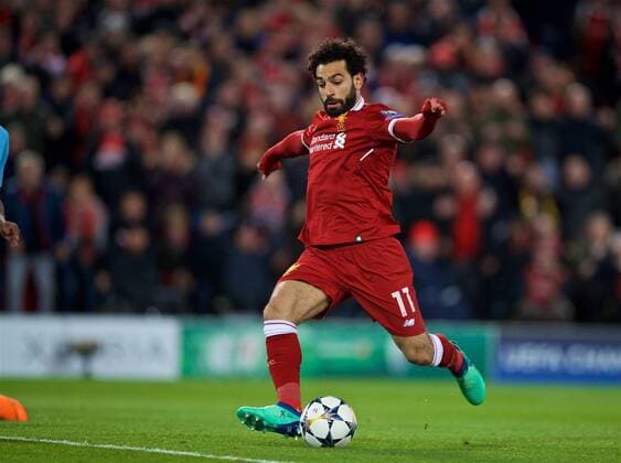 (180405) -- LIVERPOOL, April 5, 2018 -- Mohamed Salah of Liverpool scores during the UEFA Champions League quarterfinal 1st Leg match between Liverpool and Manchester City at Anfield Stadium in Liverpool, Britain on April 4, 2018. Liverpool won 3-0. FOR EDITORIAL USE ONLY. NOT FOR SALE FOR MARKETING OR ADVERTISING CAMPAIGNS. NO USE WITH UNAUTHORIZED AUDIO, VIDEO, DATA, FIXTURE LISTS, CLUB LEAGUE LOGOS OR LIVE SERVICES. ONLINE IN-MATCH USE LIMITED TO 45 IMAGES, NO VIDEO EMULATION. NO USE IN BETTING, GAMES OR SINGLE CLUB LEAGUE PLAYER PUBLICATIONS.) (SP)BRITAIN-LIVERPOOL-SOCCER-UEFA CHAMPIONS LEAGUE-LIVERPOOL VS MANCHESTER CITY HanxYan