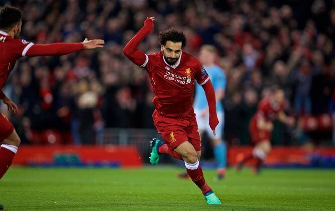 (180405) -- LIVERPOOL, April 5, 2018 -- Mohamed Salah of Liverpool celebrates scoring during the UEFA Champions League quarterfinal 1st Leg match between Liverpool and Manchester City at Anfield Stadium in Liverpool, Britain on April 4, 2018. Liverpool won 3-0. FOR EDITORIAL USE ONLY. NOT FOR SALE FOR MARKETING OR ADVERTISING CAMPAIGNS. NO USE WITH UNAUTHORIZED AUDIO, VIDEO, DATA, FIXTURE LISTS, CLUB LEAGUE LOGOS OR LIVE SERVICES. ONLINE IN-MATCH USE LIMITED TO 45 IMAGES, NO VIDEO EMULATION. NO USE IN BETTING, GAMES OR SINGLE CLUB LEAGUE PLAYER PUBLICATIONS.) (SP)BRITAIN-LIVERPOOL-SOCCER-UEFA CHAMPIONS LEAGUE-LIVERPOOL VS MANCHESTER CITY HanxYan