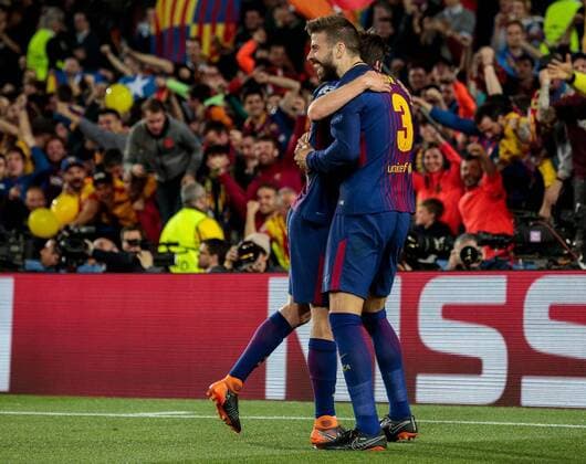 (180405) -- BARCELONA, April 5, 2018 -- Barcelona s Gerard Pique (R) celebrates scoring with his teammate during the UEFA Champions League quarterfinal 1st Leg match between FC Barcelona Barca and Roma in Barcelona, Spain, on April 4, 2018. Barcelona won 4-1. )(wll) (SP)SPAIN-BARCELONA-SOCCER-UEFA-CHAMPIONS LEAGUE-BARCELONA VS ROMA JoanxGosa 