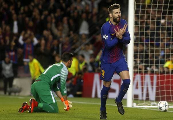 Partido de ida de 1 4 de la Liga de Campeones entre el Barcelona y la Roma en el Camp Nou. En la imagen, Pique celebra su gol. First leg of 1 4 Champions League match between Barcelona and Roma. In this picture, Pique celebrates his goal. 