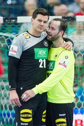 Erik SCHMIDT li GER and goalkeeper Silvio HEINEVETTER GER talking together half figure half-length portrait format Handball Laenderpiel der Manner Friendly Match Germany GER Serbia SRB 26 19 in Leipzig Germany on 04 04 2018 Â